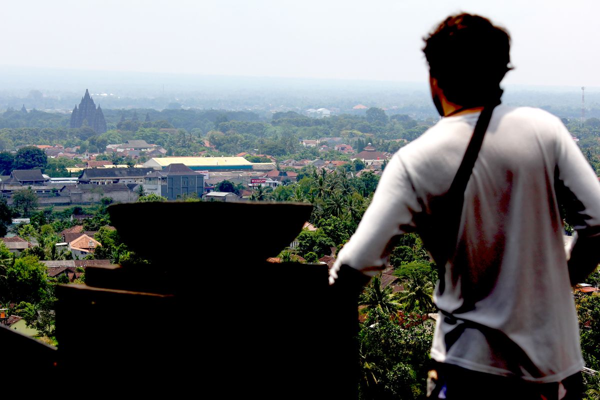 That´s me in a magical day,  looking the Prambanan Temple from Ratu Boko Temple, both of them located in Jogjakarta, Java Island, Indonesia.