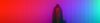 Inside a fog filled room with rainbow coloured lights penetrating the fog.  Stop motion sweep panoramic picture passing through the colours and across the path of the person.